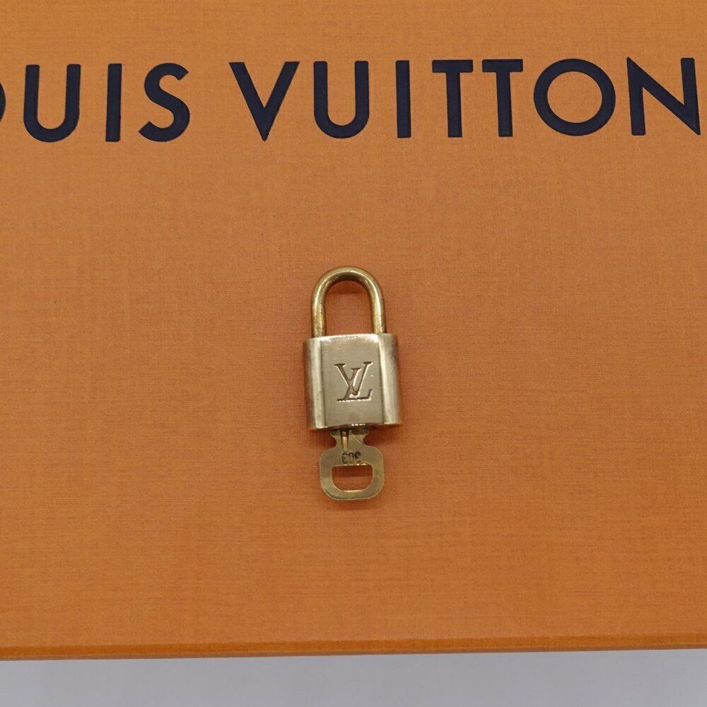 Louis Vuitton Gold/Brass toned Lock & Key #303